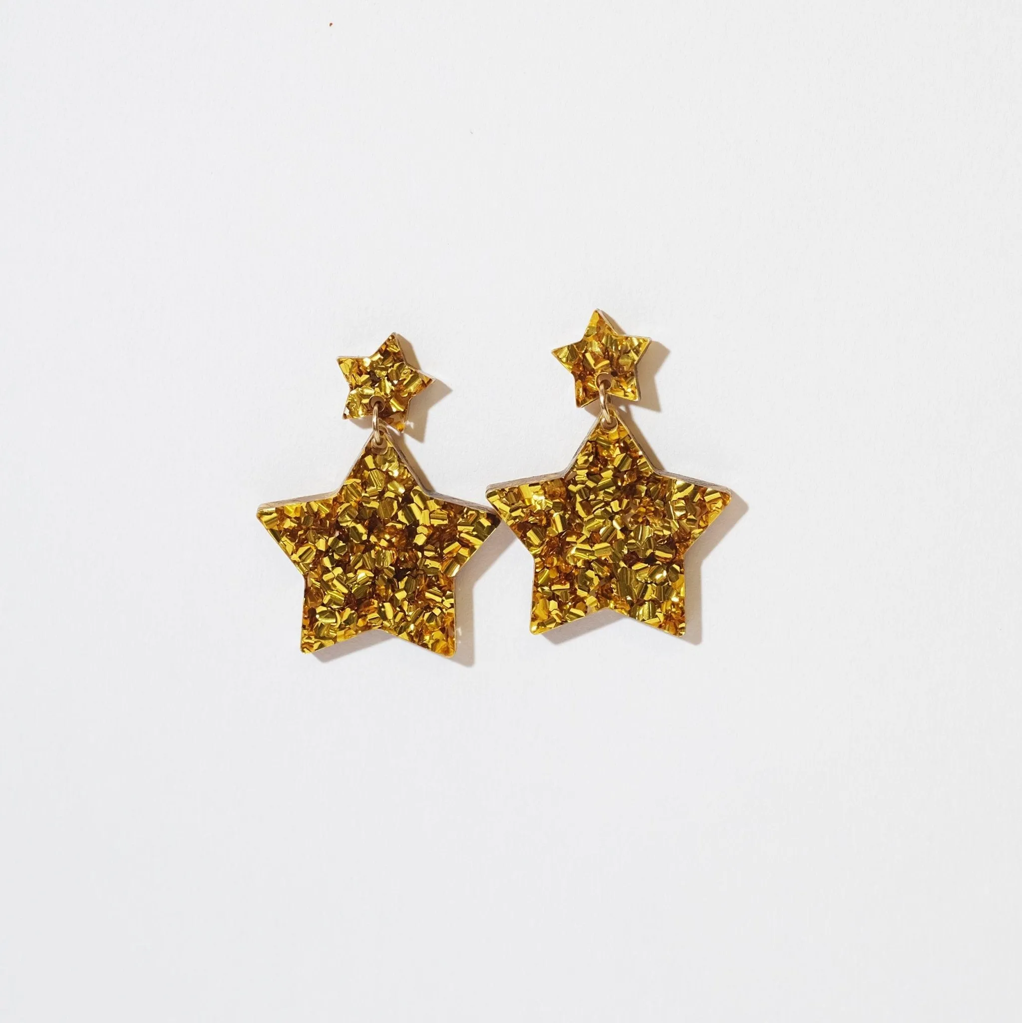 Double Star Dangle Earrings in Chunky Gold Glitter