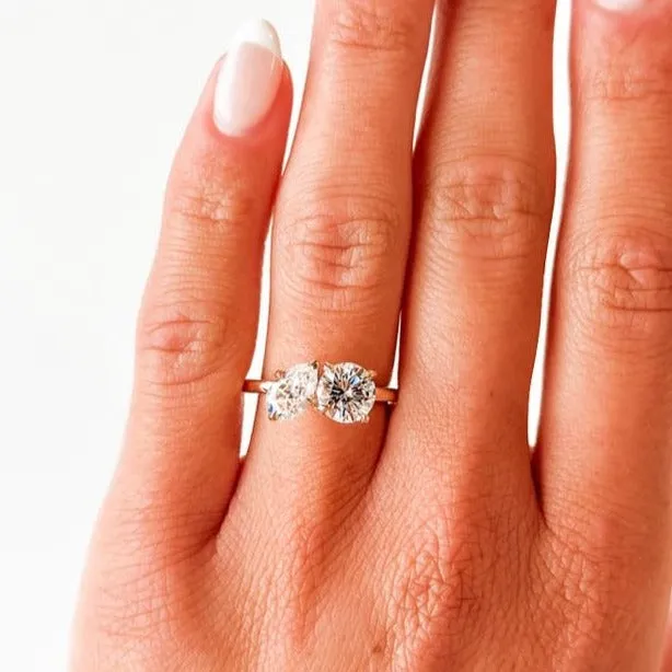 Toi & Moi Pear Shape and Round Moissanite Engagement Ring